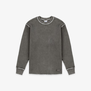 A dark gray ribbed knit long-sleeve shirt with contrasting light gray trim around the crew neck, sleeve seams, and cuffs, shown flat on a light gray background.