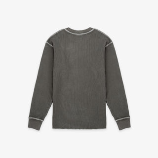 A dark gray ribbed knit long-sleeve shirt with contrasting light gray piping details along the shoulders, cuffs, and collar, shown flat against a light gray background.