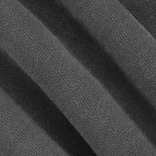 A close-up of dark charcoal gray knit fabric with soft diagonal folds showing the woven texture.