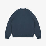 A dark navy blue crewneck sweatshirt shown from the back, laid flat against a light gray background.