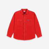 A bright red long-sleeve button-up shirt with two buttoned chest pockets, displayed flat against a light gray background.