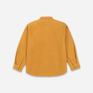A mustard yellow corduroy button-up shirt.