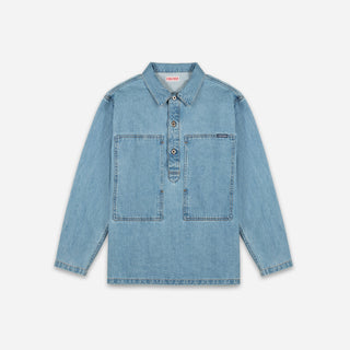 A light blue denim long-sleeve shirt-jacket with a buttoned placket and two large chest pockets, shown flat against a light gray background.