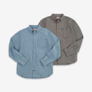 Two long-sleeve button-up shirts laid flat on a light gray background. The front shirt is light blue with a small white check pattern, and the shirt behind it is gray with a small white check pattern.
