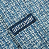 A light blue and white checkered long-sleeve button-down shirt with a Dubbleware patch label.