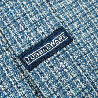 A light blue and white checkered long-sleeve button-down shirt with a Dubbleware patch label.